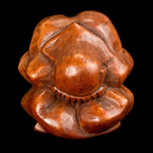 Single carved wooden weeping Buddha